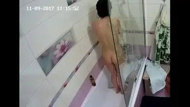 Hidden camera captures two beautiful Russian girls in the shower.