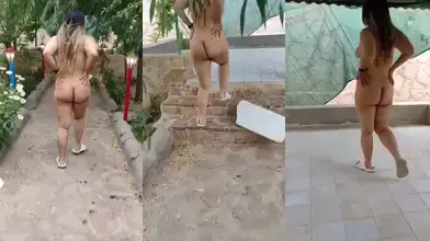 Naked wife walks in the backyard while her husband films her.