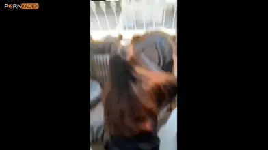 Amateur couple passionately doggy style by the window moaning and groaning.